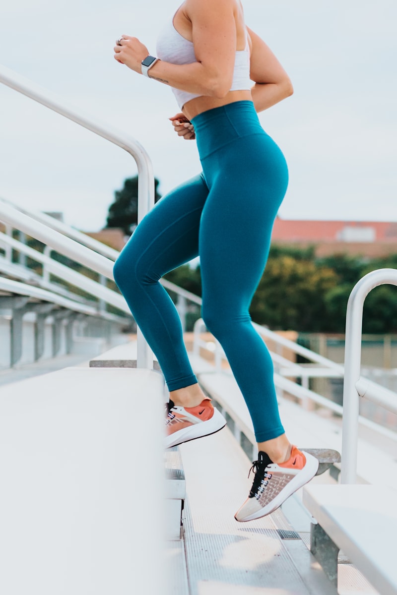Woman in her mid 50s walking on a treadmill